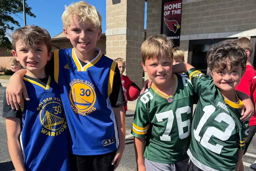 4th grade boys dressed as twins during spirit week