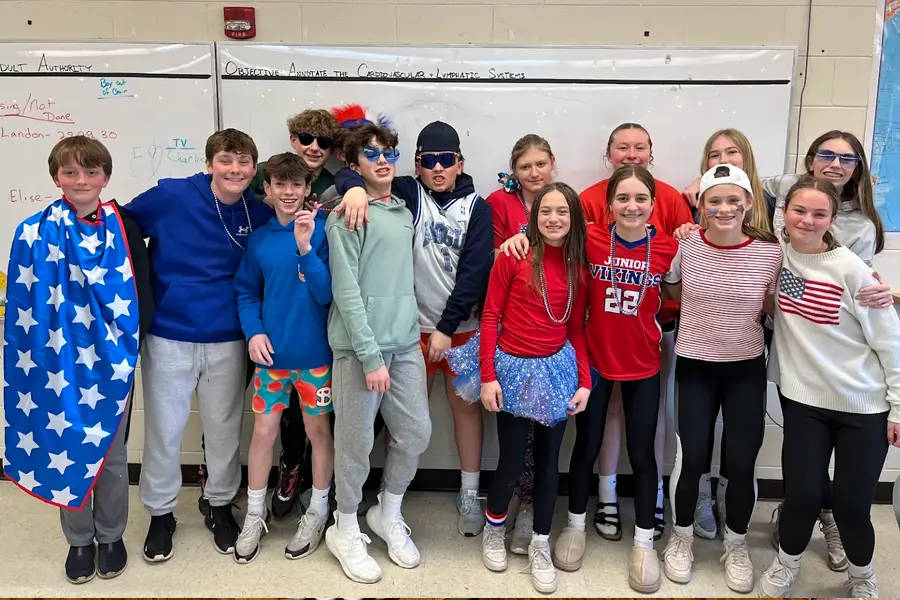7th graders dressed up in red, white and blue during spirit week
