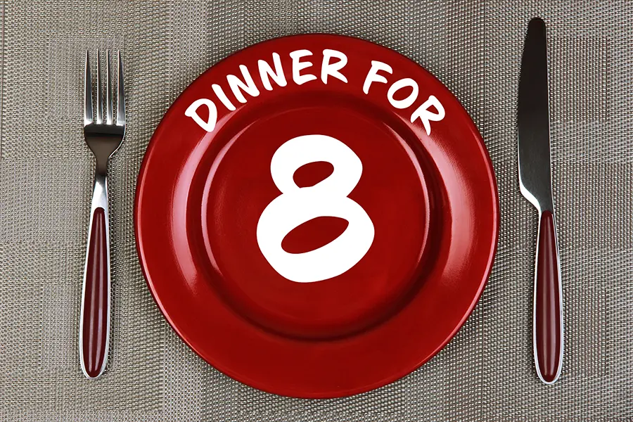 dinner for 8 written on a red dinner place setting