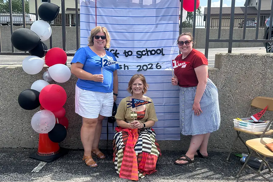 K, 1 and 2nd grade teachers posing at the Back to School 2026 photo booth